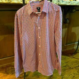 Red, white, and navy extra large H&M button down long sleeved shirt.